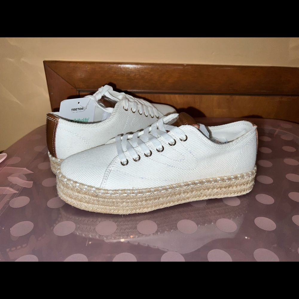 Never worn Tretorn shoes. 
Size 7.5